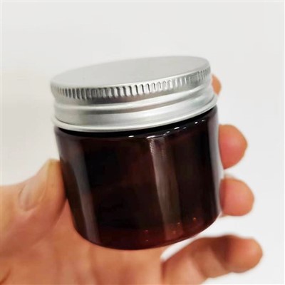 Kovové víko jantarové sklenice